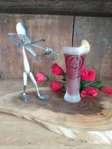 Spoon Fiddler with a frosty glass of Merry Moments Switchel